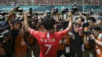 Pemain Timnas Korea Selatan U-23, Son Heung-min, setelah mengalahkan Jepang di final sepak bola putra Asian Games 2018 di Stadion Pakansari, Cibinong, Sabtu (1/9/2018). (Bola.com/Dok. INASGOC)