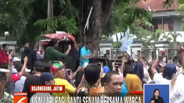 Sandi menyampaikan program perbaikan ekonomi Prabowo-Sandi untuk menstabilkan harga bahan pokok, menurunkan tarif listrik, dan memperbaiki pelayanan BPJS Kesehatan.