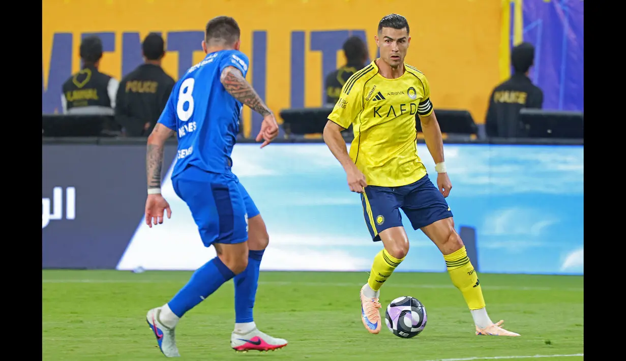 Bermain sebagai starter, Al Nassr berhasil unggul terlebih dahulu pada menit ke-37 melalui gol Mohamed Simakan. (AFP/Fayez Nureldine)