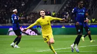 Penyerang Norwegia Bodo/Glimt, Håkon Evjen merayakan gol kedua timnya pada laga leg kedua playoff Liga Champions UEFA antara Inter Milan dan Bodo/Glimt di Stadion San Siro, Milan, Italia utara, 25 Februari 2026. (PIERO CRUCIATTI / AFP)
