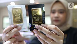 Menurut informasi dari laman logammulia.com, harga emas Antam hari ini (12/9/2024) mencapai Rp1.409.000 per gram, turun dari sebelumnya Rp1.411.000 per gram. (Liputan6.com/Angga Yuniar)