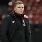 Eddie Howe merupakan sosok penting dibalik kesuksesan Bournemouth naik ke kasta pertama Liga Inggris. Ia juga mampu meracik permainan yang ciamik bersama The Cherries walaupun hanya bertahan dua musim saja. Saat ini, Eddie Howe tidak sedang melatih klub manapun. (AFP/Oli Scarff)