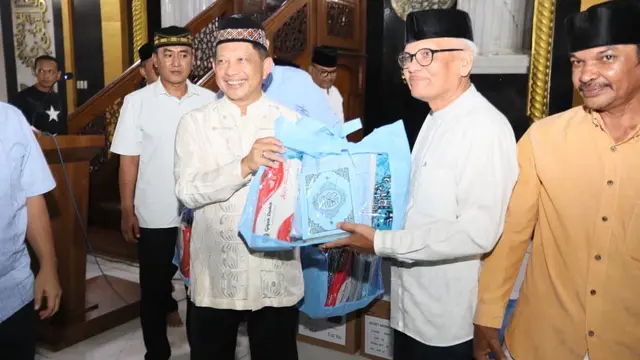 Kasatgas Tito Buka Puasa Bersama Warga Lhokseumawe, Salurkan Bantuan dan Santunan Anak Yatim