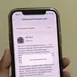 Apple menggulirkan update iOS 15.4, memungkinkan pengguna untuk membuka Face ID meski sedang pakai masker (Liputan6.com/ Agustin Setyo W).