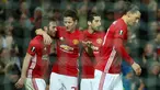 Gelandang Manchester United, Juan Mata (kiri) melakukan selebrasi usai mencetak gol ke gawang Rostov pada babak 16 Liga Europa di Stadion Old Trafford, Inggris (16/3). Gol Juan Mata membawa MU melaju ke perempat final Liga Europa. (AP Photo/Dave Thompson)