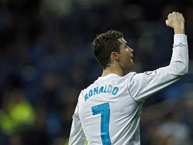Ekspresi Cristiano Ronaldo saat merayakan golnya ke gawang Getafe pada lanjutan La Liga Santander di Santiago Bernabeu stadium, Madrid, (3/3/2018). Real madrid menang 3-1. (AP/Francisco Seco)