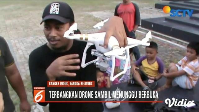 Komunitas Multicopter di Bangka Belitung menunggu waktu buka puasa dengan bermain drone.