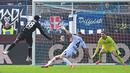 Pemain Como, Assane Diao mencetak gol kemenangan ke gawang Napoli dalam laga lanjutan Liga Italia 2024/2025 di Giuseppe-Sinigaglia Stadium, Como, Italia, Minggu (23/02/2025) waktu setempat. (AFP/Piero Cruciatti)