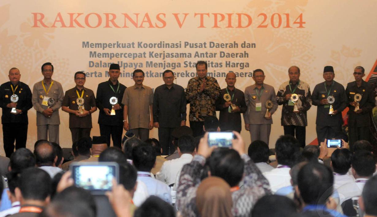 Rakornas ini membahas peningkatan kerjasama antar daerah di bidang ketahanan pangan melalui perencanaan program kerja dan penyediaan anggaran di daerah. Jakarta, (21/5/14) (Liputan6.com/Herman Zakharia)