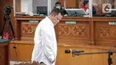 Terdakwa kasus pembunuhan Brigadir Nopriansyah Yosua Hutabarat atau Brigadir J, Kuat Ma'ruf tiba untuk menjalani sidang lanjutan di Pengadilan Negeri Jakarta Selatan, Jakarta, Rabu (26/10/2022). Dalam sidang tersebut hakim menolak eksepsi Kuat Ma'ruf. (Liputan6.com/Faizal Fanani)