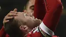 Ekspresi Wayne Rooney setelah mencetak gol ketiga MU ke gawang Stoke City dalam lanjutan Liga Inggris di Stadion Old Trafford, Manchester, Rabu (3/2/2016) dini hari WIB. (AFP/Paul Ellis)