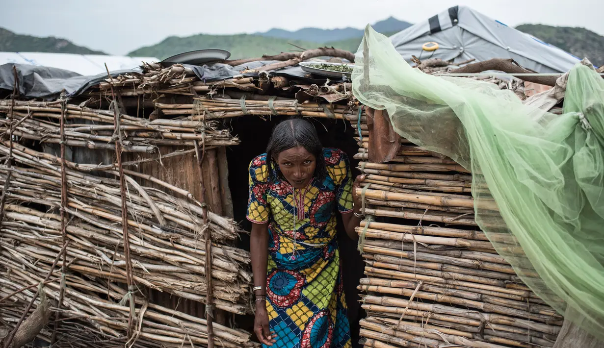 Salah satu penduduk Kota Gwoza saat berada di kamp Pengungsian Internal (IDP) di kota Gwoza, Nigeria timur laut, (1/8). (AFP Photo/Stefan Heunis)
