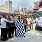 Pelepasan mobil pengangkut logistik Pemilu 2024 di Kabupaten Rokan Hulu. (Liputan6.com/M Syukur)