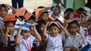 Pemerintah Filipina menggelar latihan mitigasi terjadinya gempa bumi di salah satu sekolah dasar di Manila, Filipina pada 11 September 2025. (Ted ALJIBE/AFP)