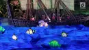 Lautan yang dihiasi ikan pada drama kolosal masa kejayaan Majapahit saat pembukaan Asian Games 2018 di Stadion Gelora Bung Karno, Senayan, Jakarta, Sabtu (18/8). (Liputan6.com/Fery Pradolo)