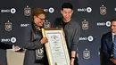 Son Heung-min mengaku bangga bisa bergabung dengan klub yang memiliki ambisi besar. (Frederic J. Brown/AFP)