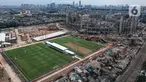 Foto dari udara menunjukkan lapangan latih Jakarta International Stadium (JIS), Jakarta, Senin (28/12/2020). JIS direncanakan mempunyai lapangan utama yang dapat menampung penonton hingga 82 ribu dengan fasilitas berstandar internasional. (Liputan6.com/Faizal Fanani)