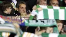Mantan Presiden Prancis, Nicolas Sarkozy ikut menonton laga grup A Liga Champions antara Celtic melawan PSG di Celtic Park stadium, Glasgow (12/9/2017). PSG menang 5-0. (Andrew Milligan/PA via AP)