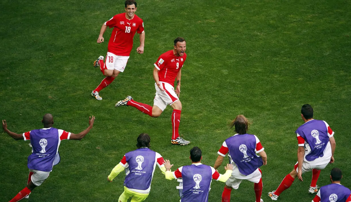 Penyerang Timnas Swiss, Haris Seferovic (9) merayakan golnya ke gawang Ekuador di laga penyisihan Piala Dunia 2014 Grup E di Estádio Nacional de Brasilia, (15/6/2014). (REUTERS/David Gray)