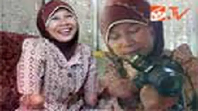 Rusidah, Fotografer Tanpa Jari