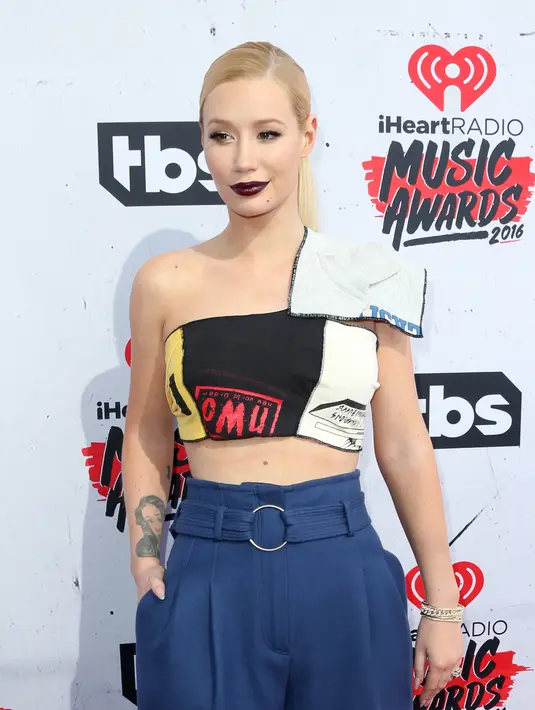 Iggy Azalea dan Kesha akan mengusung tema baru pada projek album terbaru. Mereka sepakat mengusung tema 'True Colours'. (AFP/Bintang.com)
