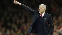 Arsene Wenger mengharapkan para pemain Arsenal mampu mempertahankan momentum positif kala berhadapan melawan Southampton, Minggu (27/12/2015) dini hari WIB. (Reuters/Carl Recine)
