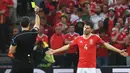 Selain Aaron Ramsey, Wales juga tidak akan diperkuat Ben Davies saat melawan Portugal karena terkena akumulasi kartu. (AFP/Philippe Huguen)