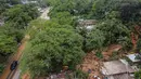 Pemandangan udara dari daerah yang terkena banjir setelah hujan lebat di distrik Juquehy di Sao Sebastiao, negara bagian Sao Paulo, Brasil (20/2/2023). Pemerintah negara bagian Sao Paulo dalam pernyataannya pada Minggu (20/2) waktu setempat menyebut sedikitnya 35 orang tewas di kota Sao Sebastiao dan satu orang lainnya, yang merupakan bocah perempuan berusia 7 tahun, tewas di wilayah Ubatuba. (AFP/Fernando Marron)