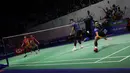 Pebulu tangkis ganda putra Indonesia, Muhammad Sohibul Fikri/Bagas Maulana (kanana) saat bertanding melawan pebulu tangkis ganda putra Indonesia, Fajar Alfian/Muhammad Rian Ardianto pada babak 16 besar Indonesia Open 2022 di Istora Senayan, Jakarta, Kamis (16/06/2022). (Bola.com/Bagaskara Lazuardi)