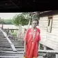 Mama Efa, nama Tese Tewes di Kampung Saa Er, Distrik Sawerma, Kabupaten Asmat, Papua, menjadi sosok utama dalam film dokumenter tentang perempuan Papua. (Liputan6.com/Dinny Mutiah)