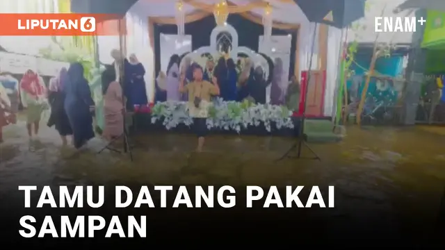 VIDEO: Resepsi Pernikahan di Tengah Banjir