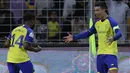 Selebrasi pemain Al Nassr, Cristiano Ronaldo setelah menjebol gawang Al Wehda dalam pertandingan lanjutan pekan ke-16 Liga Arab Saudi 2022/2023 yang berlangsung di King Abdulaziz Sports City Stadium, Jumat (10/2/2023) WIB. Ronaldo saat ini telah mencatatkan total 61 hattrick selama karier profesionalnya. Dan hattrick itu terbagi rata di dua periode usianya, yaitu sebelum dan sesudah usia 30. (AFP)