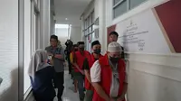 Polisi Serahkan 11 Tersangka Kasus Uang Rupiah Palsu ke Kejari Gowa 