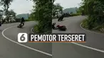 Bergaya seperti pembalap, pemotor ini jatuh dan terseret saat menikung. Beruntungnya pemotor itu tidak begitu jauh terseret.
