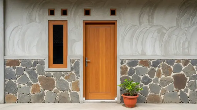Desain Kombinasi Batu Alam dan Semen Kasar yang Bikin Rumah Kampung Lebih (AI)