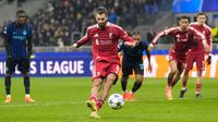 Liverpool memastikan kemenangan berkat eksekusi penalti Dominik Szoboszlai pada menit ke-88. (AP Photo/Luca Bruno)