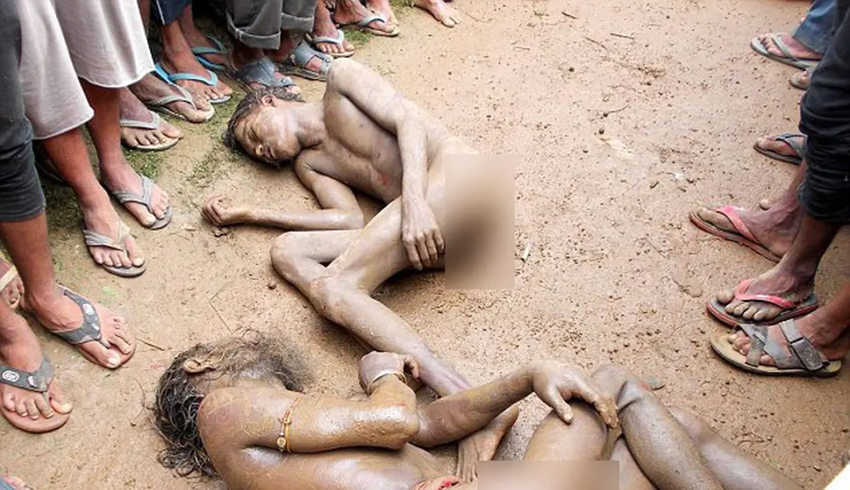 Tiga pelaku tersangka pemerkosaan dipukuli tanpa ampun oleh warga sekitar, India, Jumat (25/07/2014) (Dailymail.co.uk)