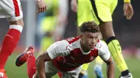 Alex Oxlade-Chamberlain menjadi bintang kemenangan 2-0 Arsenal atas Reading pada perdelapan final Piala Liga 2016/2017. (AP/Kirsty Wigglesworth)