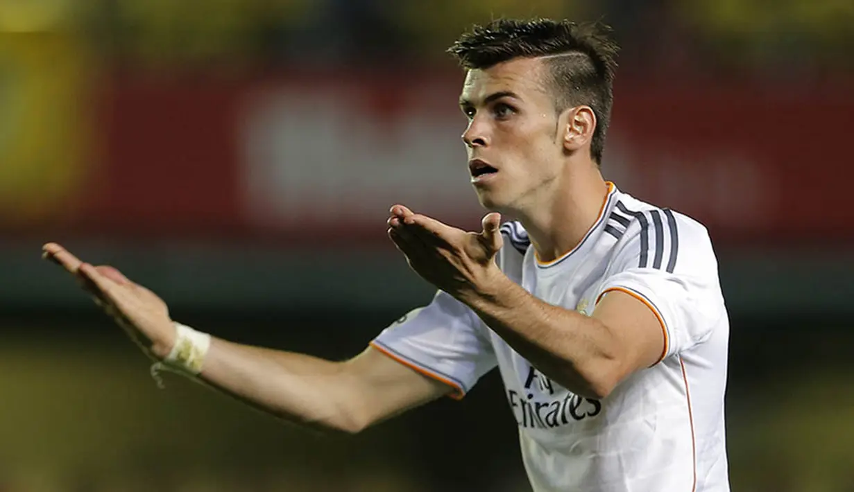 9. Jika di Real Madrid tokoh utamanya adalah Cristiano Ronaldo maka jika gabung Setan Merah, Gareth Bale akan menjadi bintang utama dari Manchester United. Sinar kebintangannya kan semakin bercahaya. (AFP/Jose Jordan)
