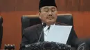 Jimly Asshiddiqie saat membacakan hasil putusan sidang pelanggaran kode etik di Ruang Sidang DKPP, Jakarta, Selasa (11/11/2014) (Liputan6.com/Herman Zakharia)