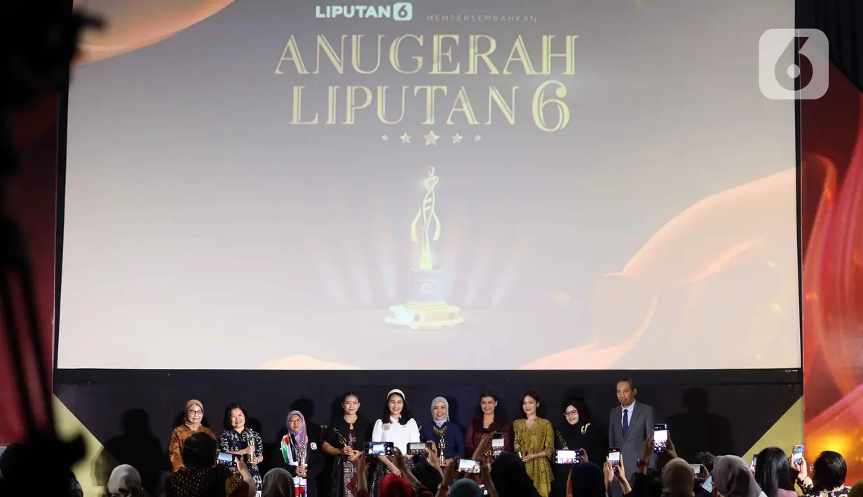 Mengusung tema "Berdaya, Berdampak, Berkelanjutan", Anugerah Liputan6 2025 menyoroti semangat penggerak perubahan dan inovasi kelembagaan yang menjadi pilar kemajuan bangsa. (Liputan6.com/Helmi Fithriansyah)