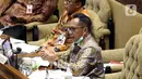 Menteri Dalam Negeri Tito Karnavian saat rapat kerja dengan Komisi II DPR di Kompleks Parlemen, Jakarta, Rabu (24/6/2020). Rapat membahas pendahuluan RAPBN TA 2021, rencana kerja pemerintah, serta upaya dan kinerja pemerintah daerah dalam menangani pandemi COVID-19. (Liputan6.com/Johan Tallo)