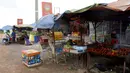 Warung yang menjual tikus bakar terlihat di provinsi Battambang (8/8/2019). Tikus bakar yang lebih besar dijual dengan harga 1,25 USD atau sekitar 17000 ribu rupiah. (AFP Photo/Tang Chhin Sotthy)