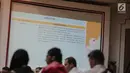 Penjelasan dari KPU yang ditampilkan di layar saat penyuluhan peraturan KPU Nomor 11 Tahun 2017 di Gedung KPU Pusat, Jakarta, Rabu (27/9). (Liputan6.com/Faizal Fanani)