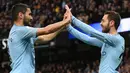 Gelandang Manchester City, Bernardo Silva, merayakan gol yang dicetaknya ke gawang Bournemouth pada laga Premier League di Stadion Etihad, Manchester, Sabtu (1/12). City menang 3-1 atas Bournemouth. (AFP/Oli Scarff)