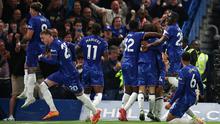 Bek Chelsea asal Spanyol #03, Marc Cucurella (tak terlihat), merayakan gol pertamanya bersama rekan satu timnya selama pertandingan Liga Primer Inggris antara Chelsea dan Manchester United di Stamford Bridge di London, Sabtu dini hari WIB (17-5-2025). (HENRY NICHOLLS /AFP)