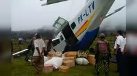Pesawat tergelincir di Papua (Liputan6.com/ llyas Istianur Praditya)