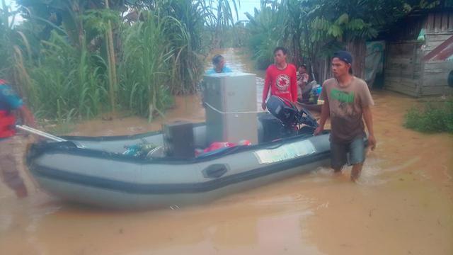 Banjir melanda Dharmasraya, Sumatera Barat pada Senin (13/12/2021). (Liputan6.com/ BPBD Dharmasraya)