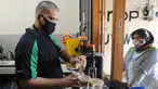 Ahmad Hilmy Almusawa, pemuda 22 tahun penyandang tunanetra meracik kopi pesanan pelanggan di Mata Hati Koffie di Jalan Cabe, Pondok Cabe Ilir, Pamulang, Tangerang Selatan, Banten, Selasa (21/7/2020). (merdeka.com/Arie Basuki)