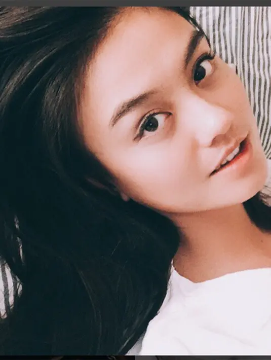 Di bawah foto dirinya tertulis nama dirinya 'Agnez Mo'. Lebih ke bawah ada tulisan 3000. (Via Instagram/@agnezmo)